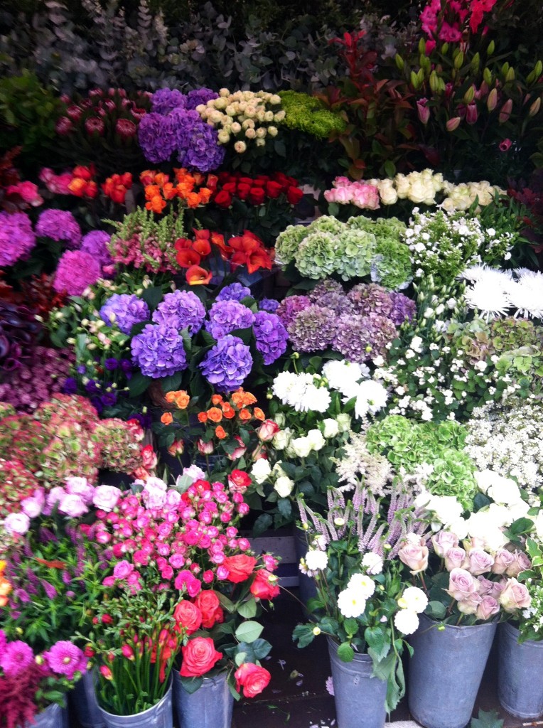 Market stall full of fresh flowers.